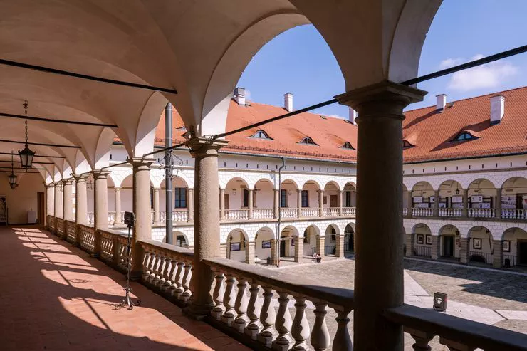 A view of three wings of the arcaded inner courtyard from the upper gallery.